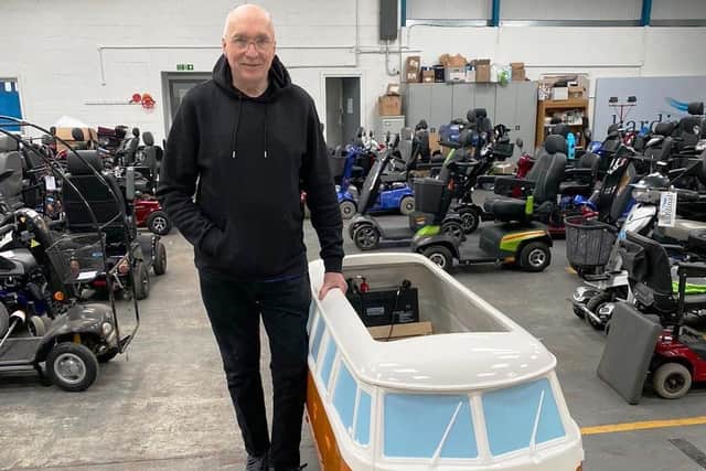 Peter Arter with the back-up mobility scooter, which will be painted to look like the other one