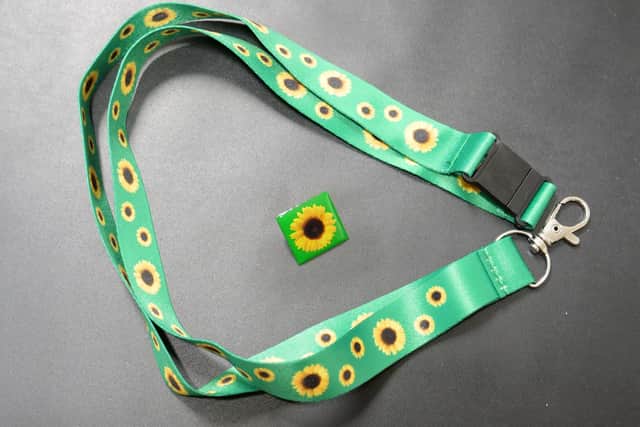 Example of a sunflower lanyard and badge