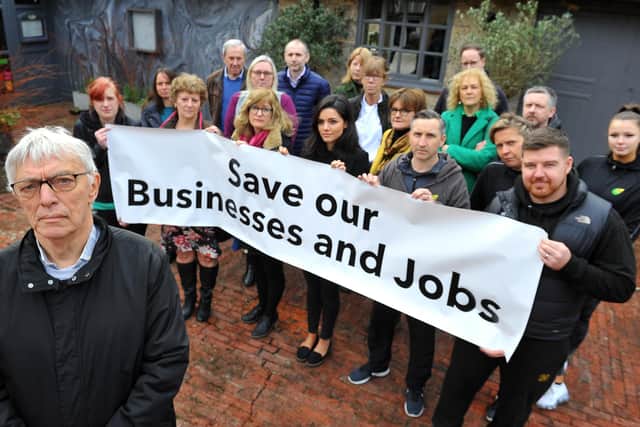 Jeremy Ashpool (front) and other concerned business owners. Picture: Steve Robards