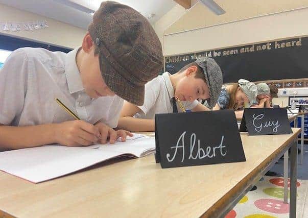 Girls and boys were given Victorian names and sat separately all day for lessons such as handwriting practice. Picture: Steyning Primary School