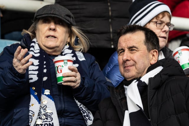 A cup of tea keeps the cold out for this PNE fan at Peterborough