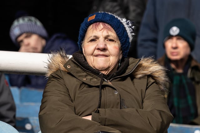 A PNE fan gets ready to watch the game against Peterborough