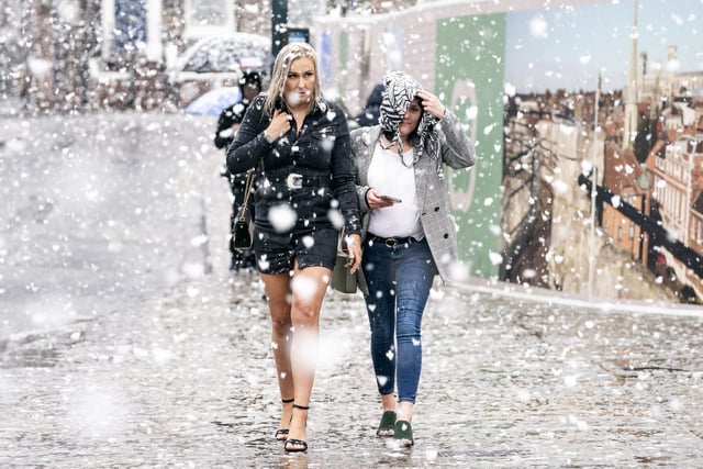 Two women caught in the snow in York