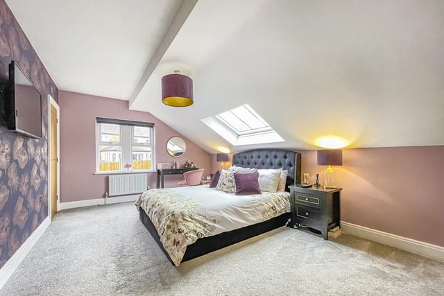 One of the spacious bedrooms within the cottage property.