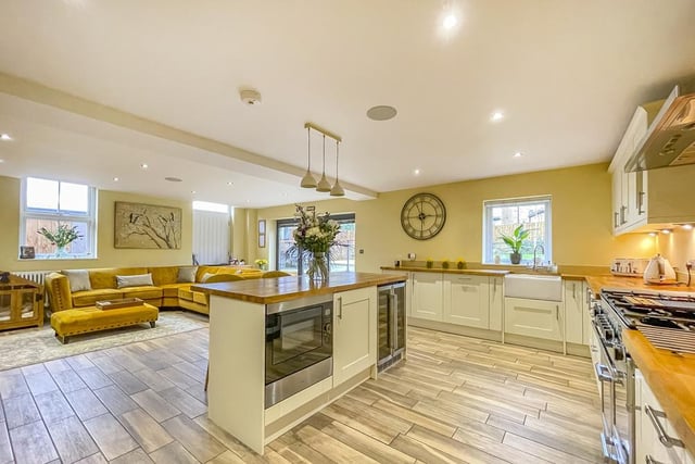 The kitchen links to a comfortable and spacious family area