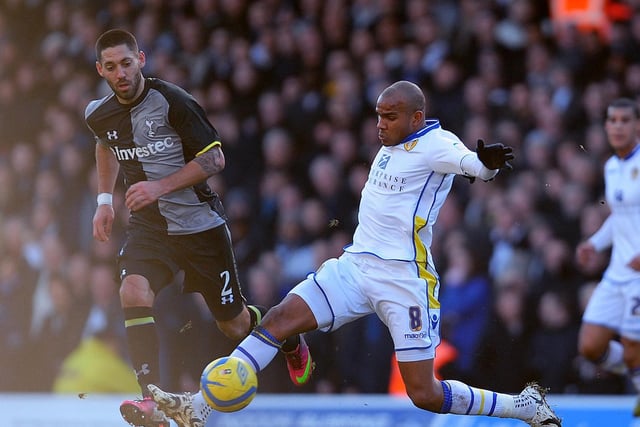 Tottenham Hotspur's Clint Dempsey (left) and Leeds United's Rodolph Austin battle for the ball during the FA Cup, Fourth Round match at Elland Road, Leeds. PRESS ASSOCIATION