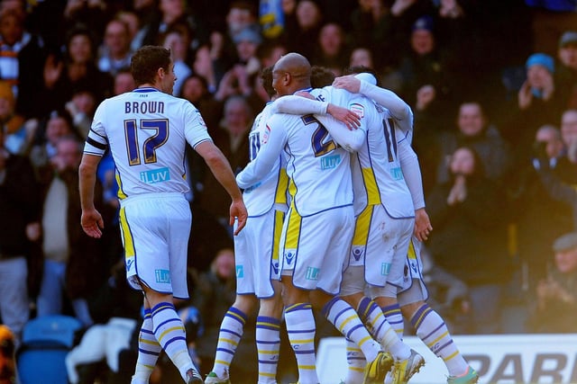 Leeds United players celebrate Luke Varney's opening goal during the FA Cup, Fourth Round match at Elland Road, Leeds. PRESS ASSOCIATION