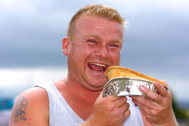 Copleys Farm Shop Festival pie eating 2010 champion Bob Newbould celebrates at the Pontefract event