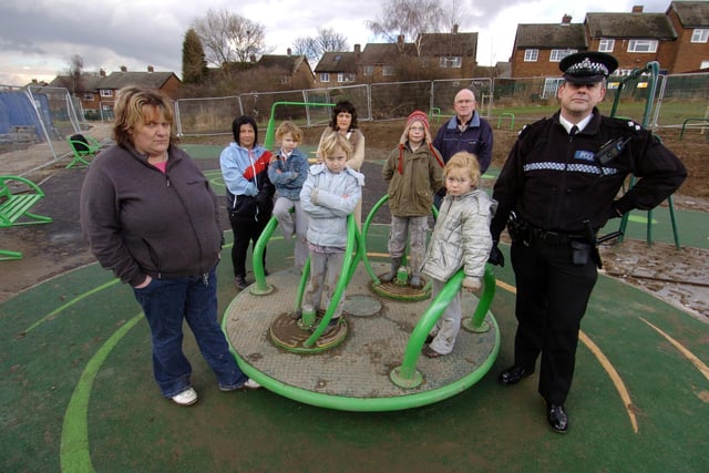 Karen Kerr with Insp Dick Jones at Priory Road playground in Featherstone which had been damaged by arsonists