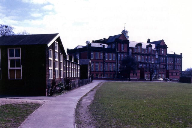 A rear view of West Leeds High School. Boys were housed to the left and girls to the right. They only mixed in the kindergarten in the wooden huts to the left.