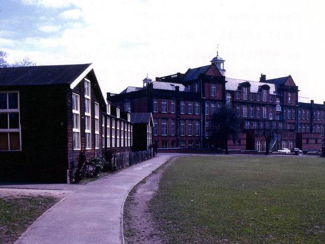 A rear view of West Leeds High School. Boys were housed to the left and girls to the right. They only mixed in the kindergarten in the wooden huts to the left.