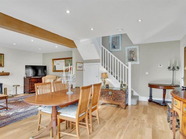 The stylish interior with dining and living space combined.