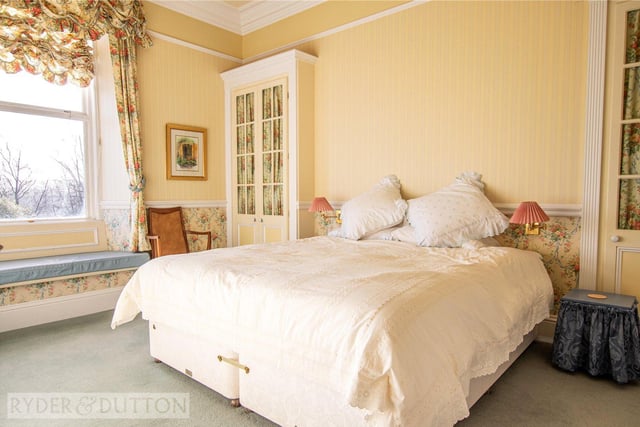 A window seat is a feature of this bedroom, from which you can enjoy the views.