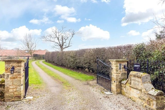 Enter from Potterton Lane via remote controlled entrance gates and a sweeping private driveway.