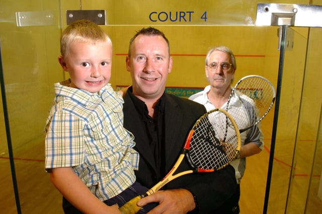 Pontefract Squash Club owner Mick Todd with son Sam and coach Malcolm Willstrop.