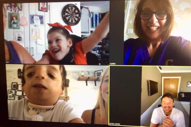 Peter Andre chatting with Karen, Izzy and Loui via video call