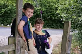 Members of the 1st Roffey Scout group during the adapted centenary walk SUS-200630-111858001