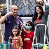 Capturing Lockdown - The Khan family in Broadfield. Photo by Woodard Photography