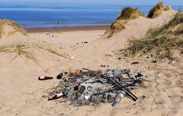 Litter left on sand dunes. Picture: Colin Lane