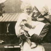 A nurse holding a baby in the 1920s. Picture: Horsham Museum and Art Gallery