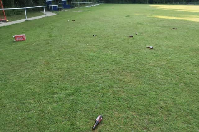 Bottles have been left strewn across the pitches SUS-200607-113036001