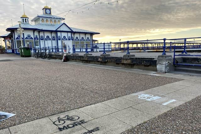 Eastbourne Greenpeace activists have left chalk messages on the ground aimed at the government SUS-200707-121037001