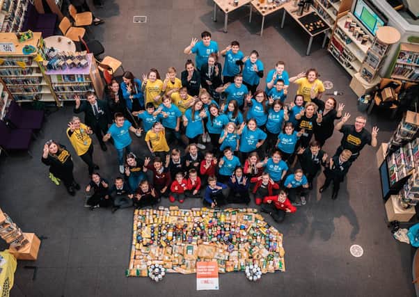 The Regis School's Rights Respecting team planned and co-ordinated the largest food drive in the academy's history with the help of ten other schools from across the area