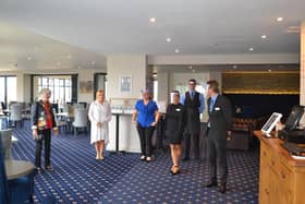 Bexhill Mayor with staff at Cooden Beach Hotel SUS-200807-124551001