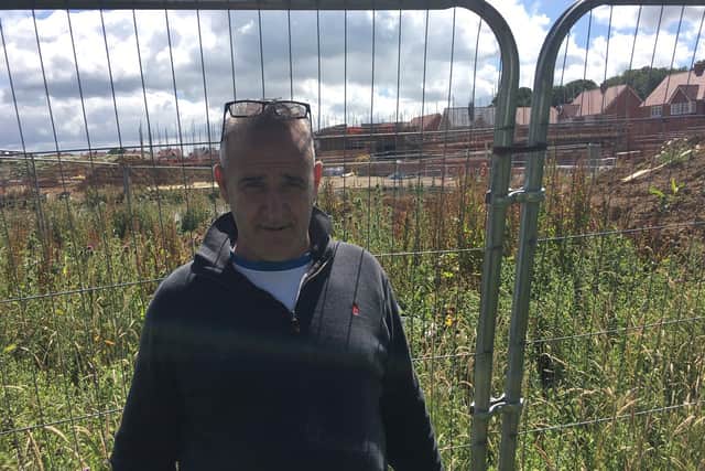 Councillor Neil Cleaver at Hailsham Cuckoo Meadow housing development