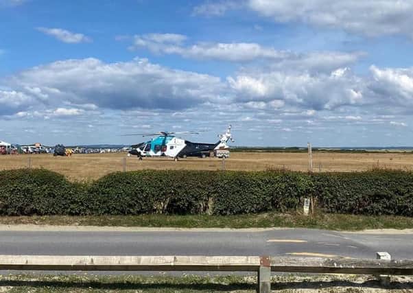 The air amulance landed near West Wittering beach SUS-201207-120936001