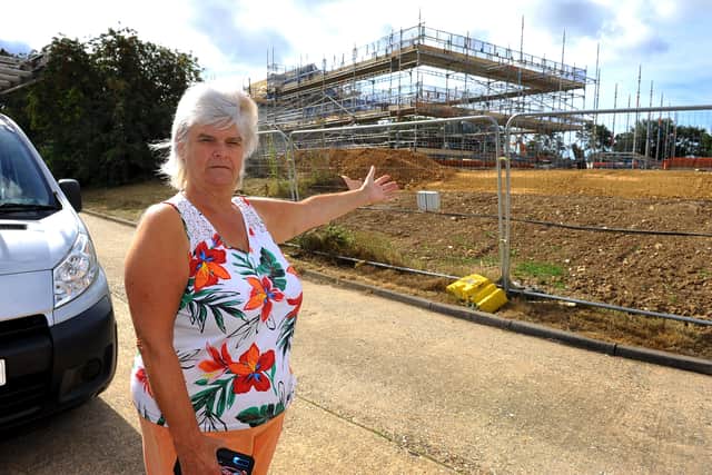 Lorna Haynes is frustrated about the redevelopment of Daisyfields campsite behind her house. Picture: Steve Robards