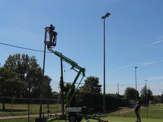 The new lights go up at Hailsham Tennis Club
