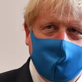 Boris Johnson wearing a mask  (Photo by Ben Stansall-WPA Pool/Getty Images)