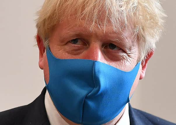 Boris Johnson wearing a mask  (Photo by Ben Stansall-WPA Pool/Getty Images)
