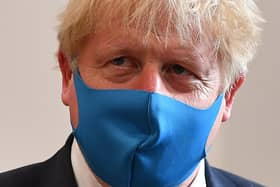 Boris Johnson wearing a mask (Photo by Ben Stansall-WPA Pool/Getty Images)