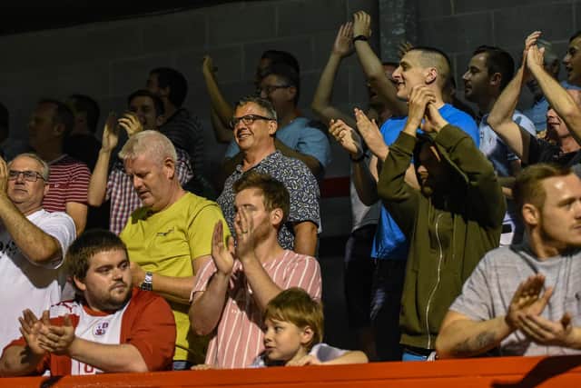 Crawley Town fans at the Norwich City Carabao Cup victory