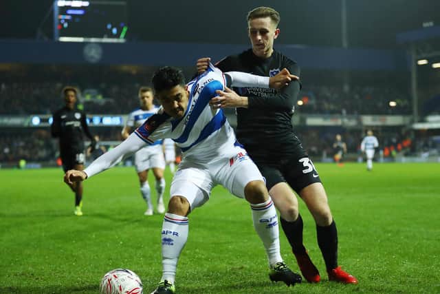 Adam May in action for Portsmouth against QPR in the FA Cup