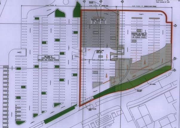 The proposed extension is the grey area in the bottom right hand corner
