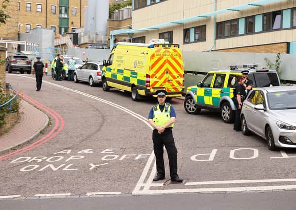 Police at the hospital in Brighton this morning