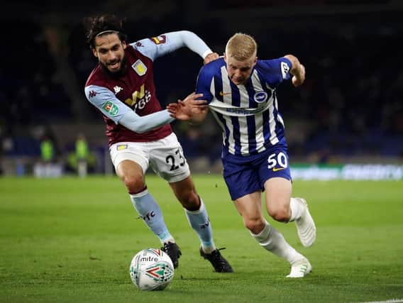 Alex Cochrane in action for Brighton against Aston Villa in the Carabao Cup last September