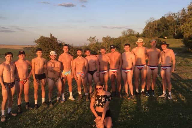 The friends at the start of the 24-hour walk in Speedos for Look Sussex, with Lucy Croke, one of the people the charity supports