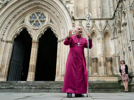 The new Bishop of York Stephen Cottrell reacts as he addresses members of the congregation outside the West Door of York Minster following his Confirmation of Election as the 98th Archbishop of York which was broadcast via video conference.