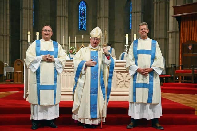 Deacons Simon South and Dominic Dring with Bishop
Richard Moth SUS-200721-162816001