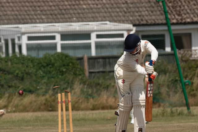 Aldwick's Liam Hicks is out to the club's first ball of the season / Picture: Tommy McMillan