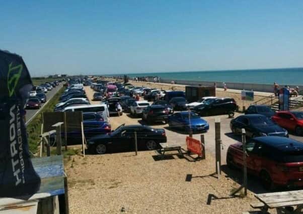 The car parks at Camber Sands have been full to capacity a number of times this summer SUS-200625-084653001