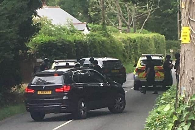 Man arrested after armed police respond to Battle incident