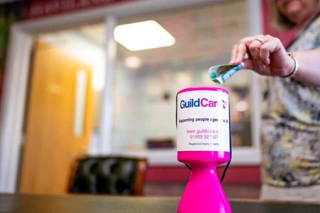 Collection tins can be found at businesses from Lancing to Arundel