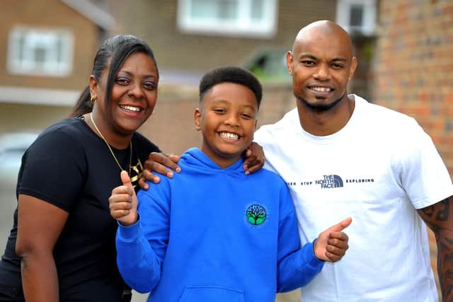 Layton Mamarot has completed primary school with perfect attendance, pictured with his parents Vanessa and Sylvain. Pic Steve Robards SR2007254 SUS-200725-163622001