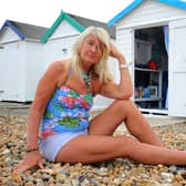 Michele Spicer at her beach hut at Sea Place, Goring