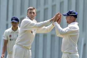 Eastbourne skipper Jacob Smith celebrates a wicket last season